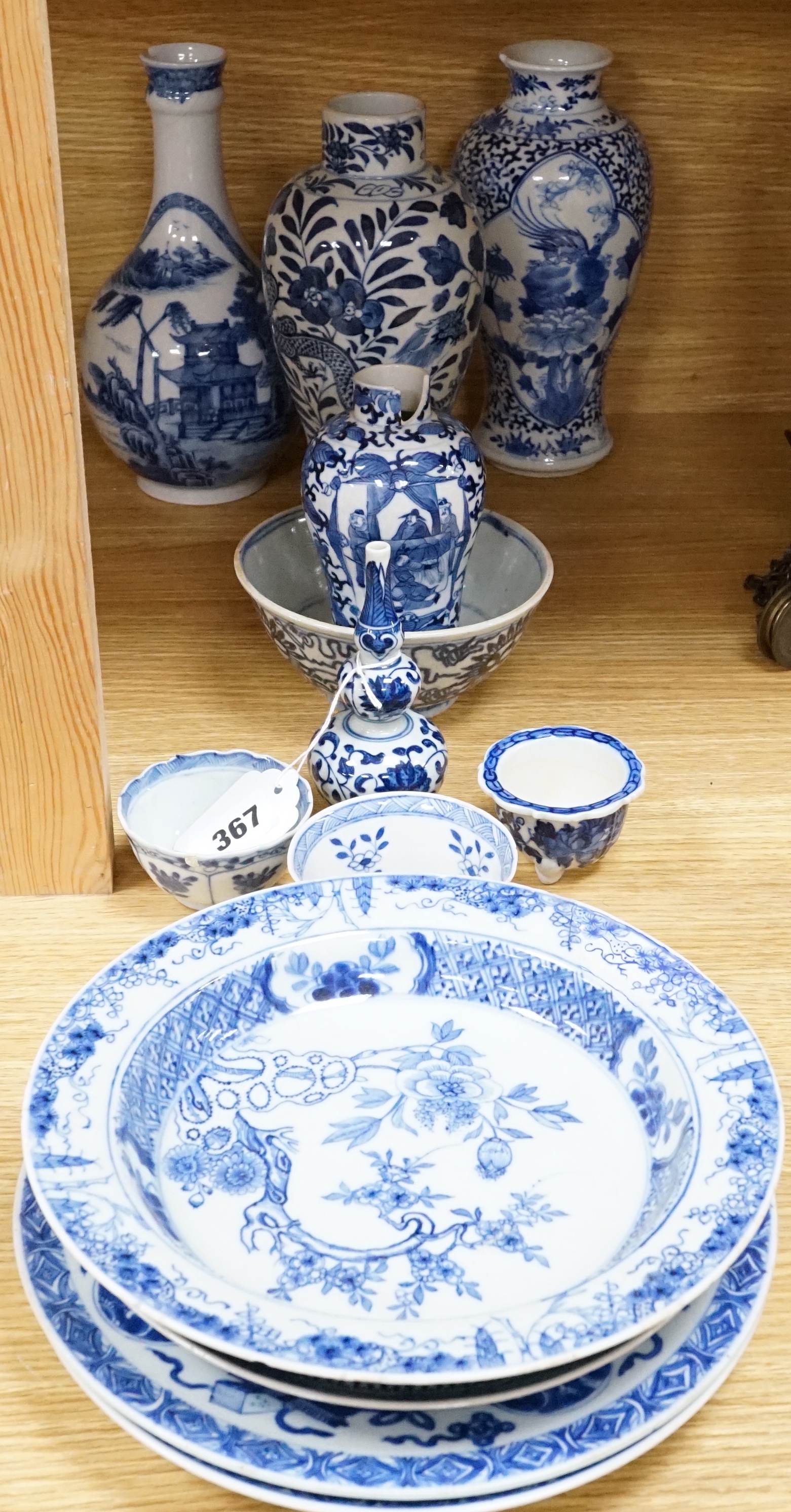 A quantity of blue and white Chinese porcelain dishes and vessels, 18th century and later, tallest 22.5cm